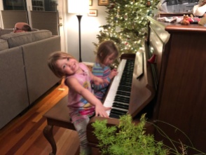 girls at a piano