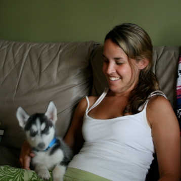 woman with husky puppy